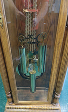 Load image into Gallery viewer, Grandfather Clock...by Howard Miller